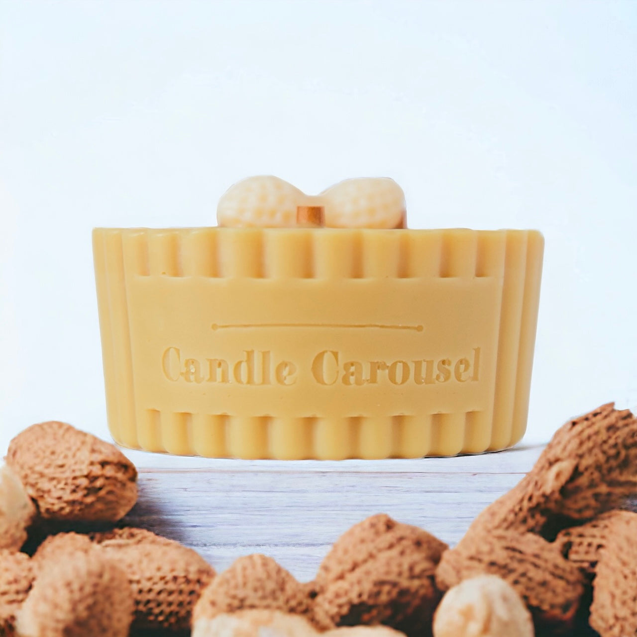 The Candle Carousel Sustainable Vegan and Cruelty Free Brand Company, Candles To Action!®️ Circus Monkey Nuts (sweet Peanuts) ~ Charity Candle Refill. Side View with Ingredient Demo. Buy Today and Pair with our Refillable Dishes to Refill Time and Time again!